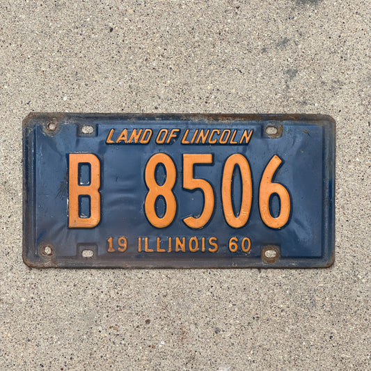Photo of a 1960 Illinois Truck License Plate Auto Tag Garage Decor Vintage Orange Blue B 8506 with original patina