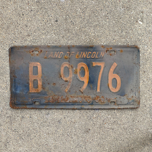 Photo of a 1960 Illinois Truck License Plate Auto Tag Garage Decor Vintage Orange Blue B 9976 with original patina