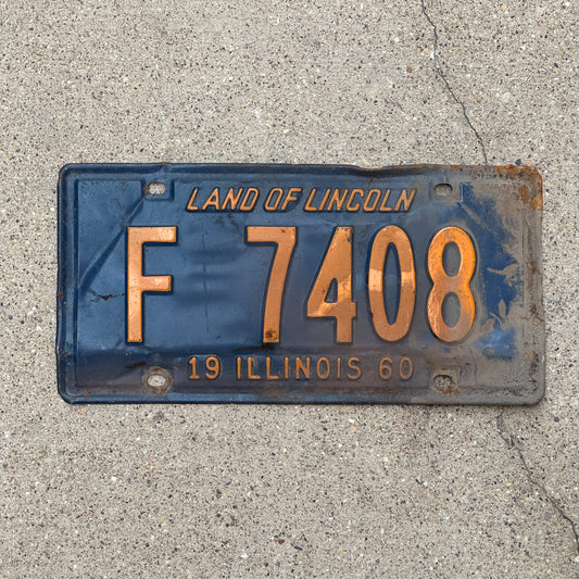 Photo of a 1960 Illinois Truck License Plate Auto Tag Garage Decor Vintage Orange Blue F 7408 with original patina
