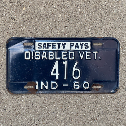 Photo of a 1960 Indiana Disabled Veteran License Plate Auto Tag Garage Decor Vintage DAV 416 with original patina