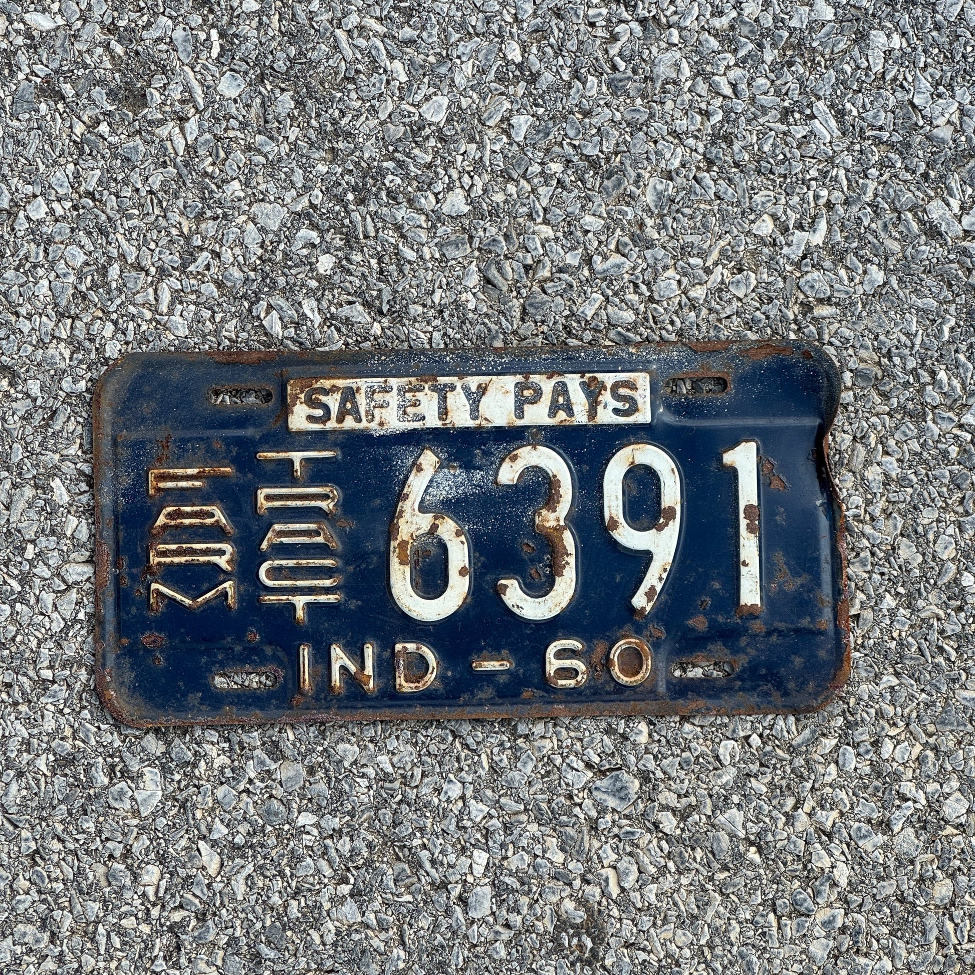 Photo of a 1960 Indiana Farm Tractor License Plate Auto Tag Garage Decor Vintage 6391