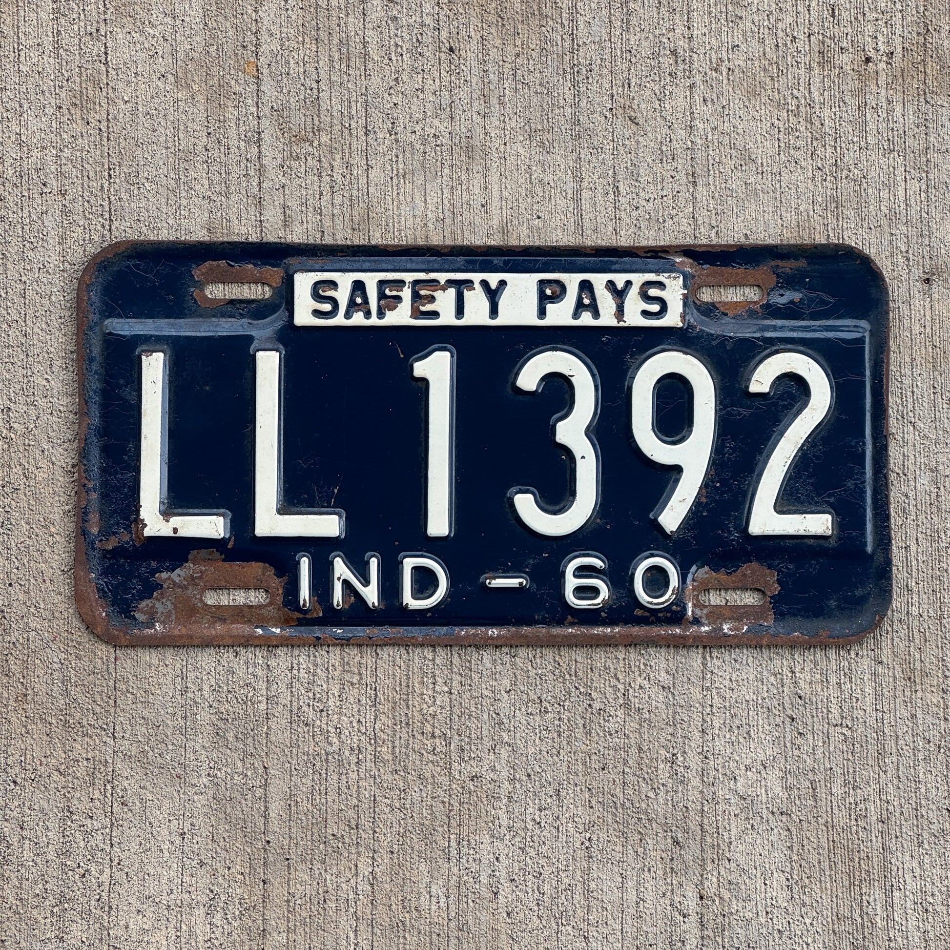 Photo of a 1960 Indiana License Plate Auto Tag Garage Decor Vintage LL 1392 with original patina