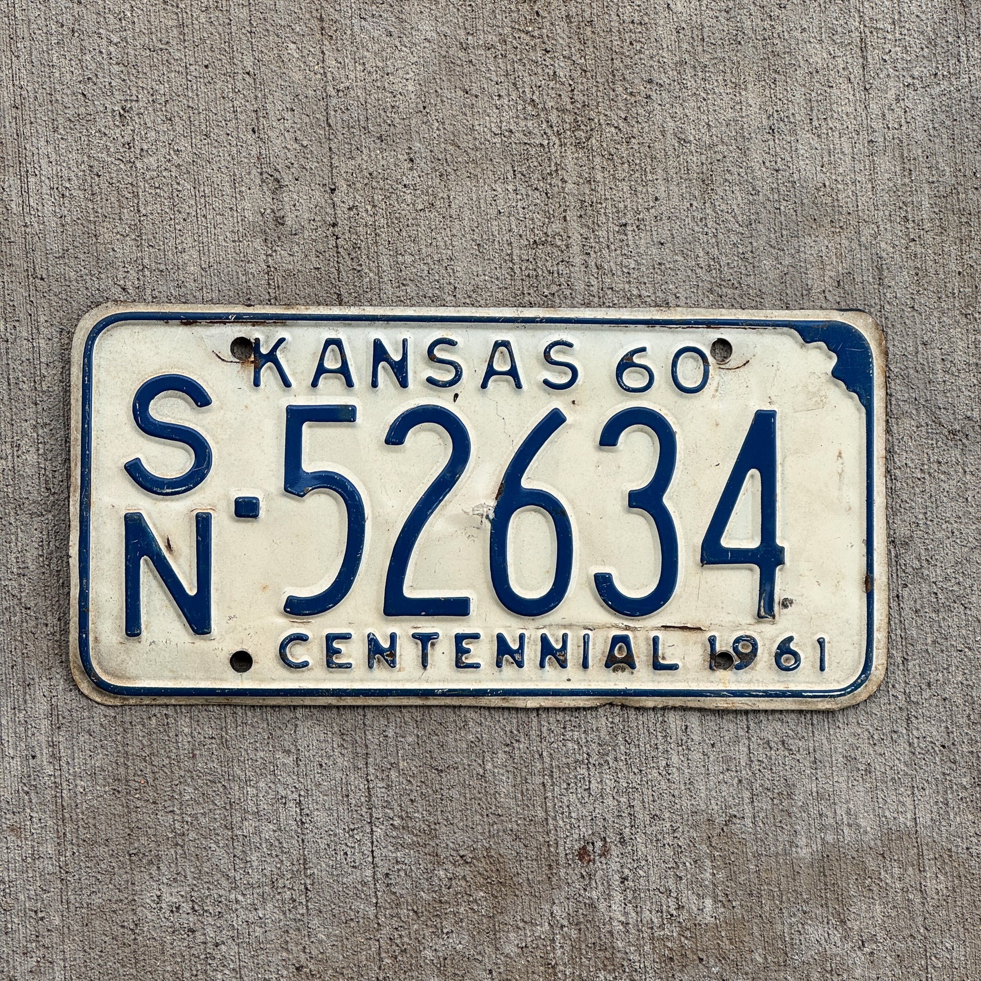 Photo of a 1960 Kansas License Plate Auto Tag Garage Decor Vintage SN 52634 with original patina