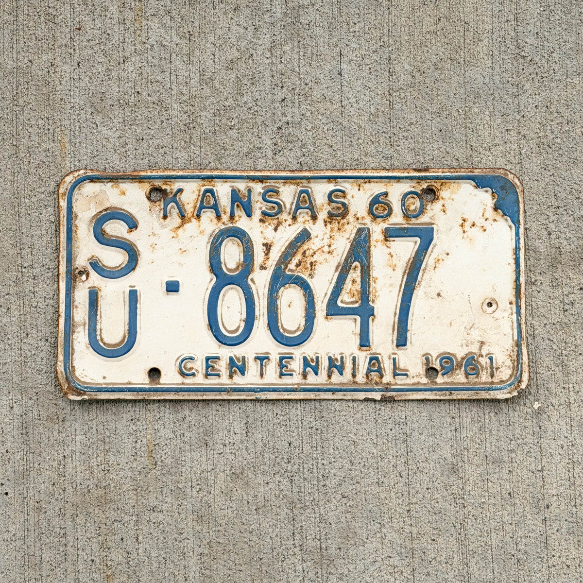 Photo of a 1960 Kansas License Plate Auto Tag Garage Decor Vintage SU 8647 with original patina