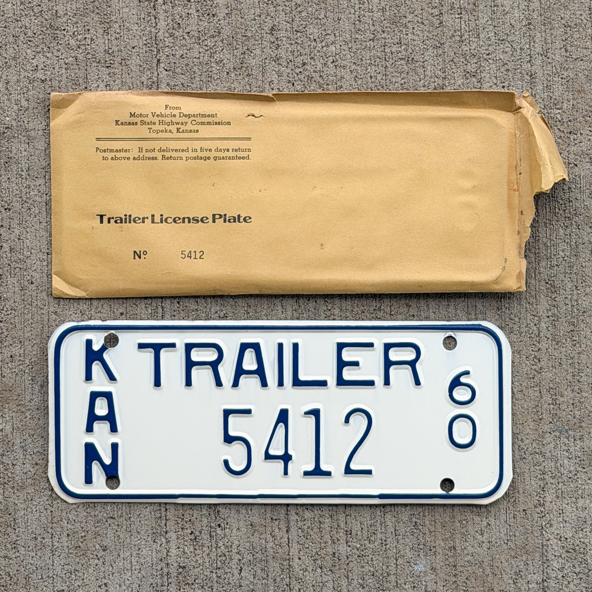 Photo of a 1960 Kansas Trailer License Plate Auto Tag Garage Decor Vintage 5412 with original patina