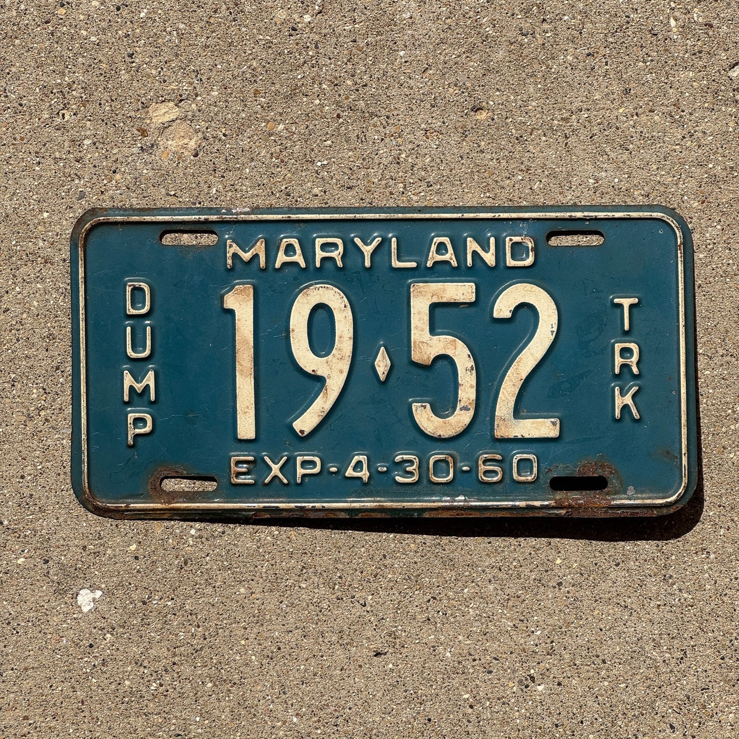 Photo of a 1960 Maryland DUMP TRUCK License Plate Auto Tag Garage Decor Vintage 1952