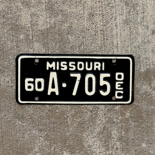 Photo of a 1960 Missouri Motorcycle License Plate Auto Tag Garage Decor Vintage A 705 with original patina