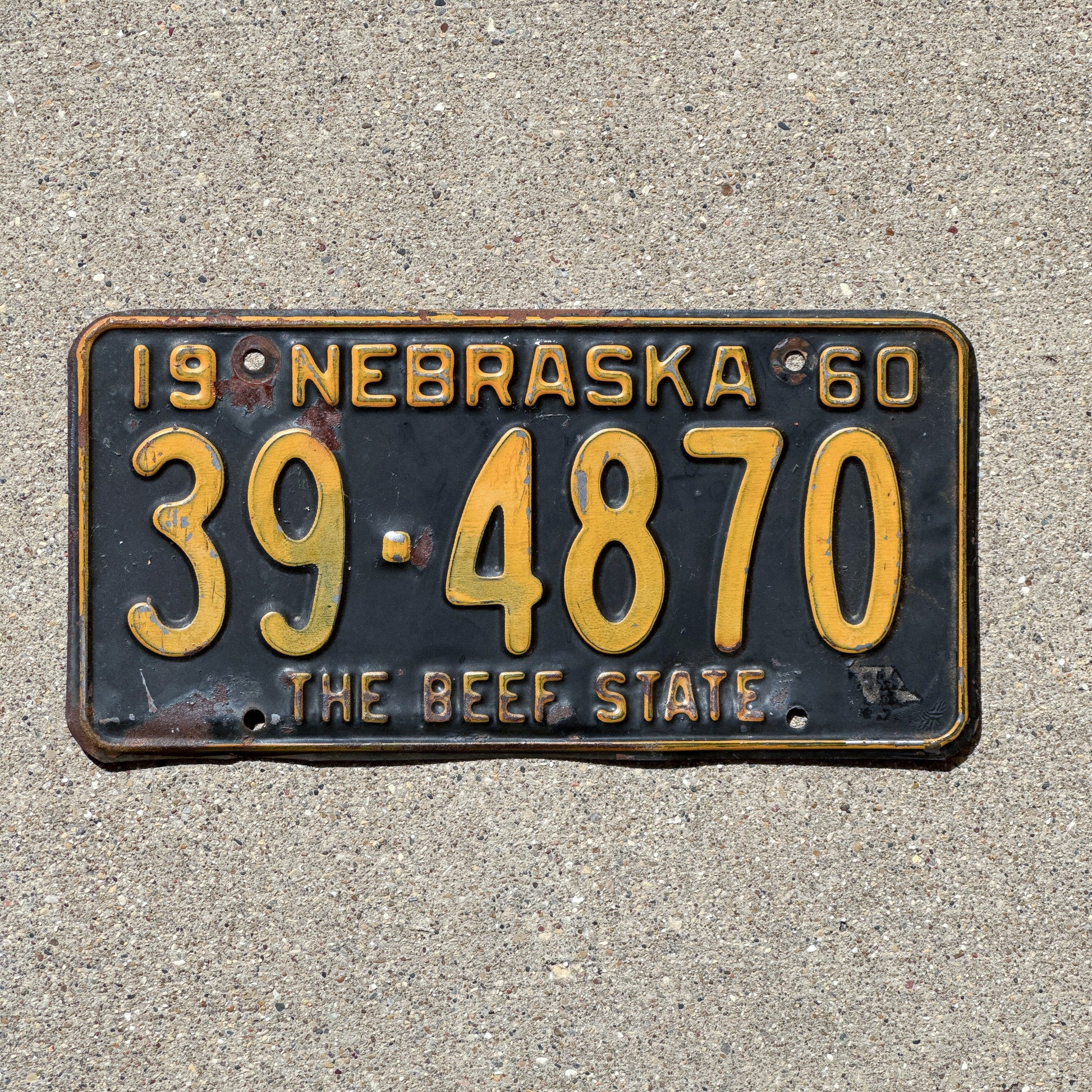 Photo of a 1960 Nebraska License Plate Auto Tag Garage Decor Vintage 39 4870 with original patina