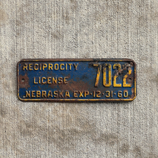 Photo of a 1960 Nebraska Reciprocity License Plate Auto Tag Garage Decor Vintage 7022 with original patina