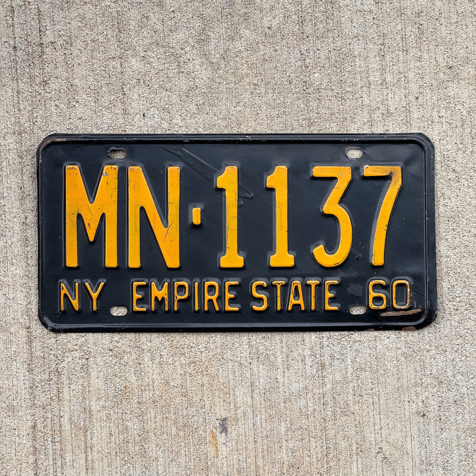 Photo of a 1960 New York License Plate Auto Tag Garage Decor Vintage MN 1137