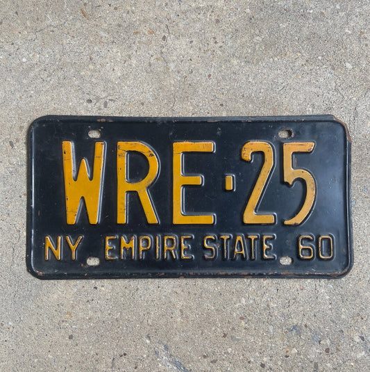Photo of a 1960 New York License Plate Auto Tag Garage Decor Vintage WRE 25 with original patina