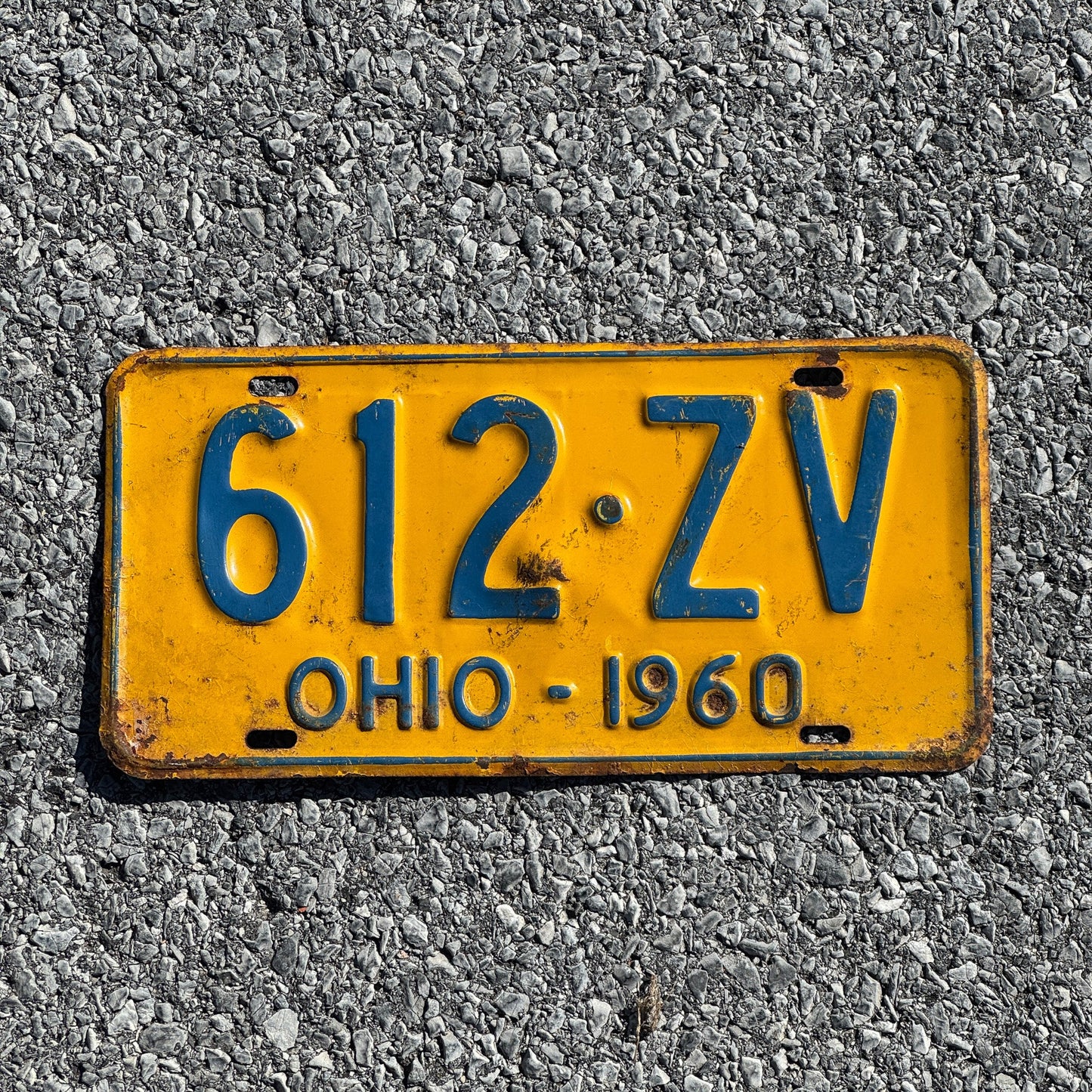 Photo of a 1960 Ohio License Plate Auto Tag Garage Decor Vintage 612 ZV