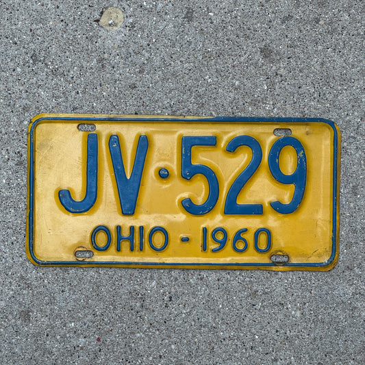 Photo of a 1960 Ohio License Plate Auto Tag Garage Decor Vintage JV 529 with original patina