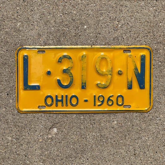 Photo of a 1960 Ohio License Plate Auto Tag Garage Decor Vintage L 319 N