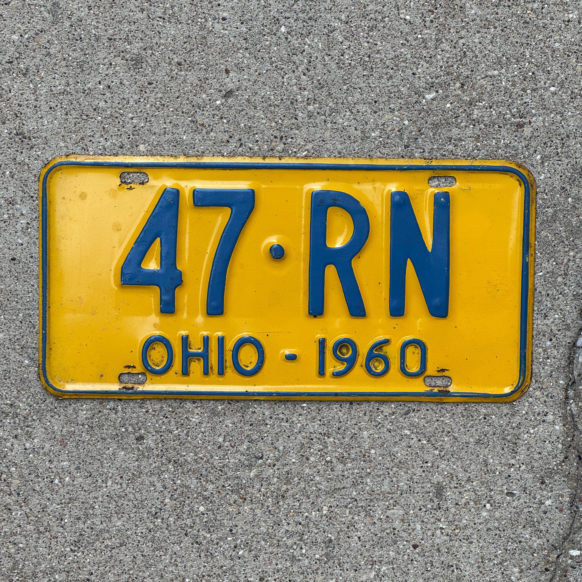Photo of a 1960 Ohio License Plate Auto Tag Garage Decor Vintage Nurse Gift 47 RN with original patina