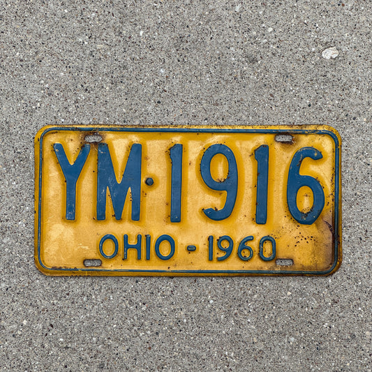 Photo of a 1960 Ohio License Plate Auto Tag Garage Decor Vintage YM 1916 with original patina