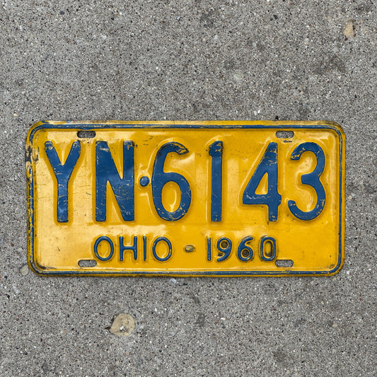 Photo of a 1960 Ohio License Plate Auto Tag Garage Decor Vintage YN 6143 with original patina