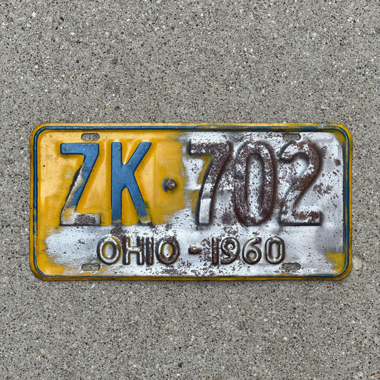 Photo of a 1960 Ohio License Plate Auto Tag Garage Decor Vintage ZK 702 with original patina