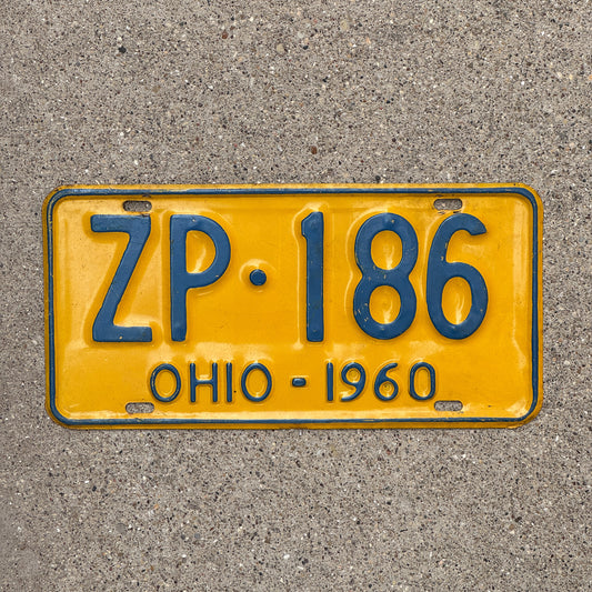 Photo of a 1960 Ohio License Plate Auto Tag Garage Decor Vintage ZP 186 with original patina
