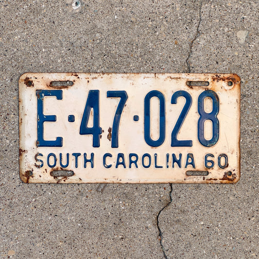 Photo of a 1960 South Carolina License Plate Auto Tag Garage Decor Vintage E 47 028 with original patina