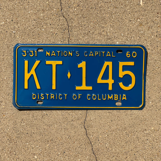 Photo of a 1960 Washington DC License Plate Auto Tag Garage Decor Vintage Blue Yellow KT 145