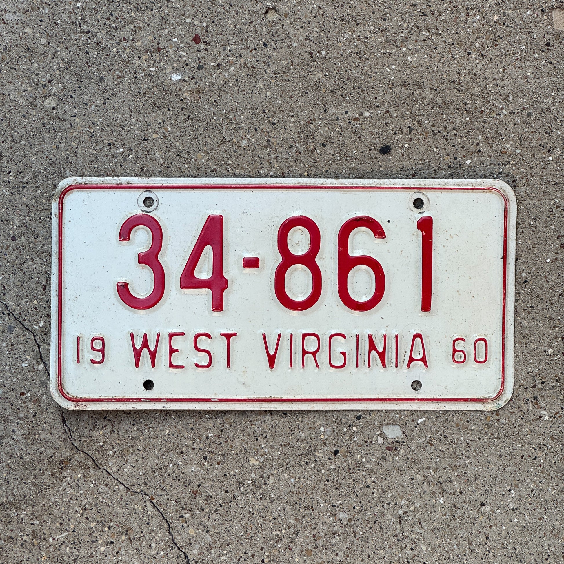 Photo of a 1960 West Virginia License Plate Auto Tag Garage Decor Vintage 34 861 with original patina