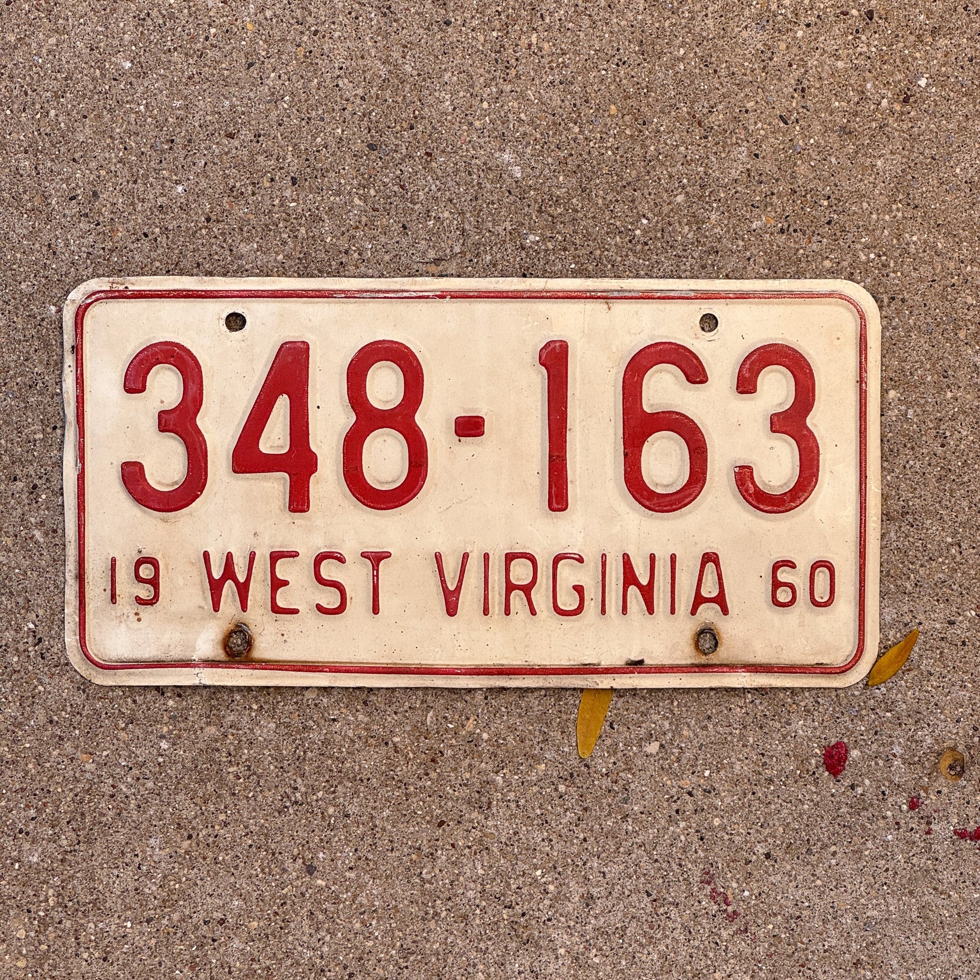 Photo of a 1960 West Virginia License Plate Auto Tag Garage Decor Vintage 348 163 with original patina