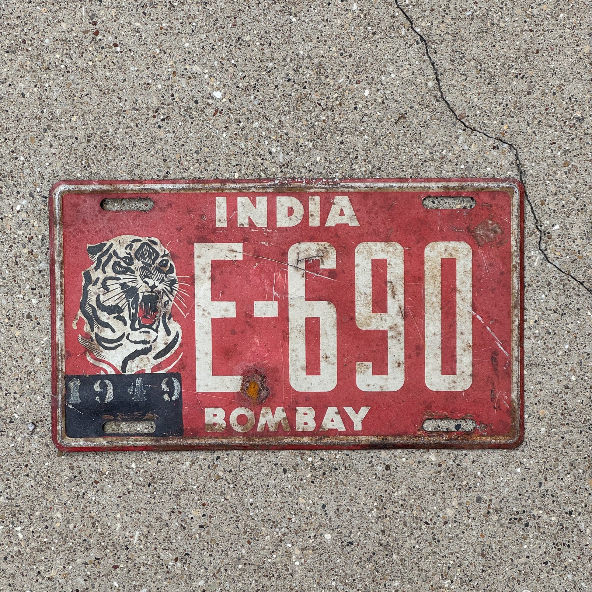 Photo of a 1960s 1970s India Globe Trotter License Plate Auto Tag Garage Decor Vintage Bombay Tiger E 690