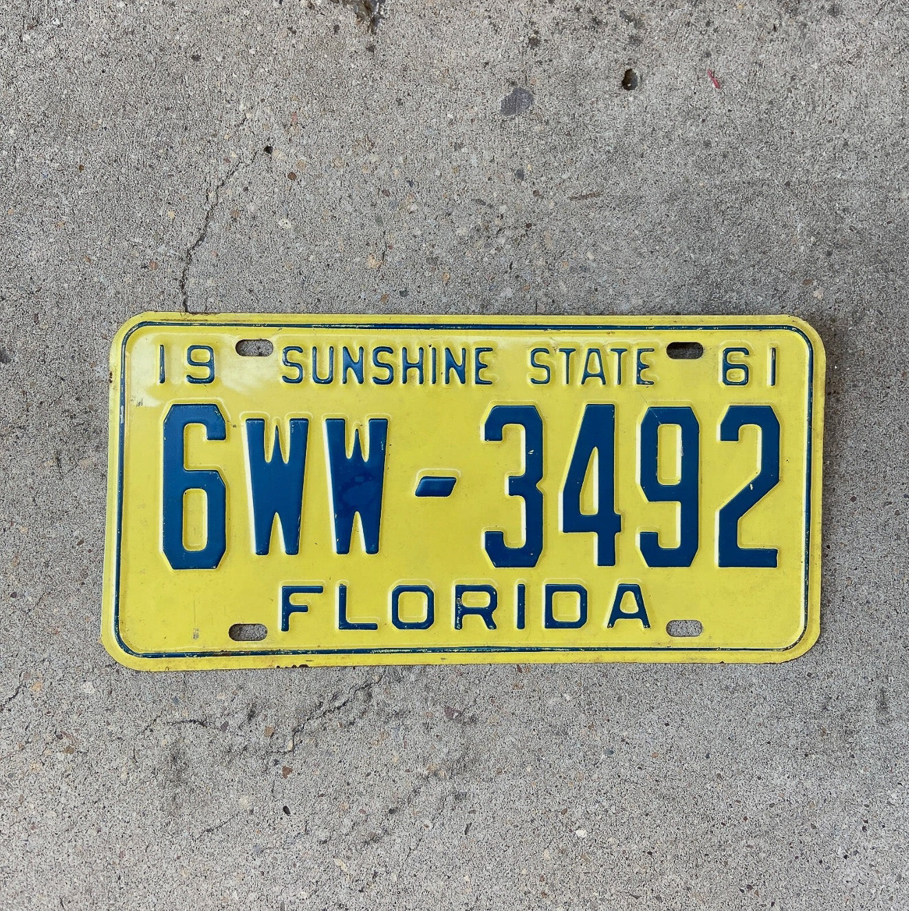 Photo of a 1961 Florida License Plate Auto Tag Garage Decor Vintage Palm Beach 6 WW 3492 with original patina