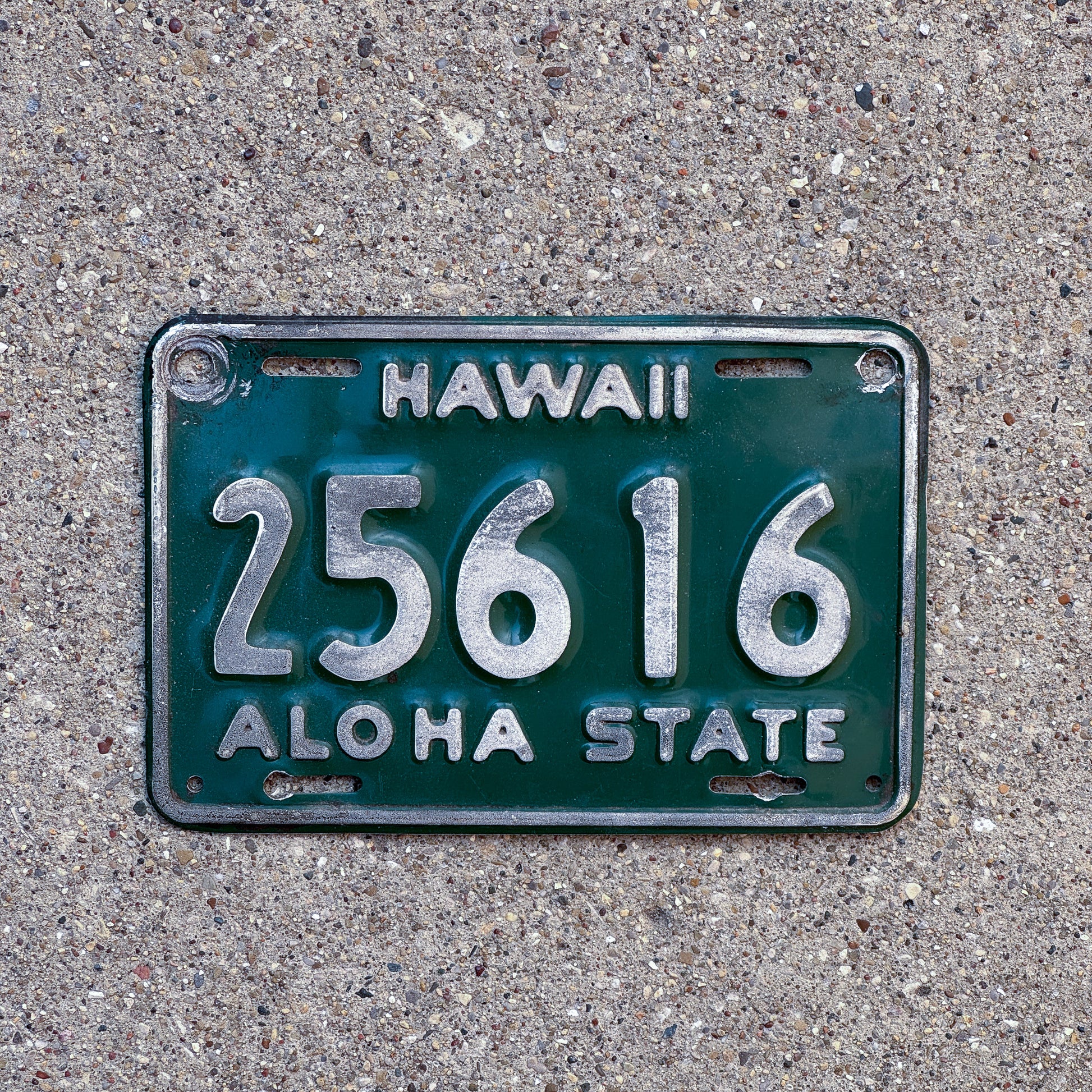 Photo of a 1961 Hawaii Motorcycle License Plate Auto Tag Garage Decor Vintage 25616 with original patina