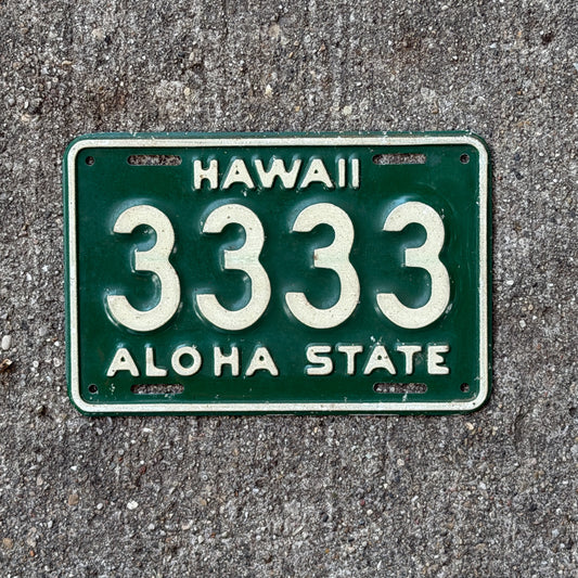 Photo of a 1961 Hawaii Motorcycle License Plate Auto Tag Garage Decor Vintage Repeat Repeating 3333 with original patina
