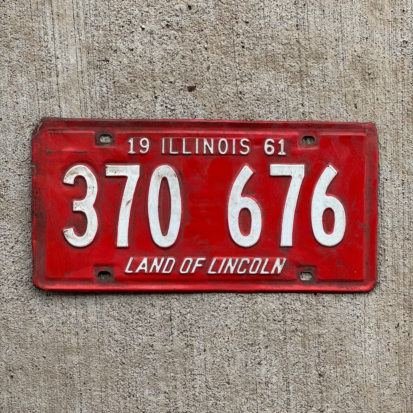 Photo of a 1961 Illinois License Plate Auto Tag 1 Vintage Garage 370 676 with original patina