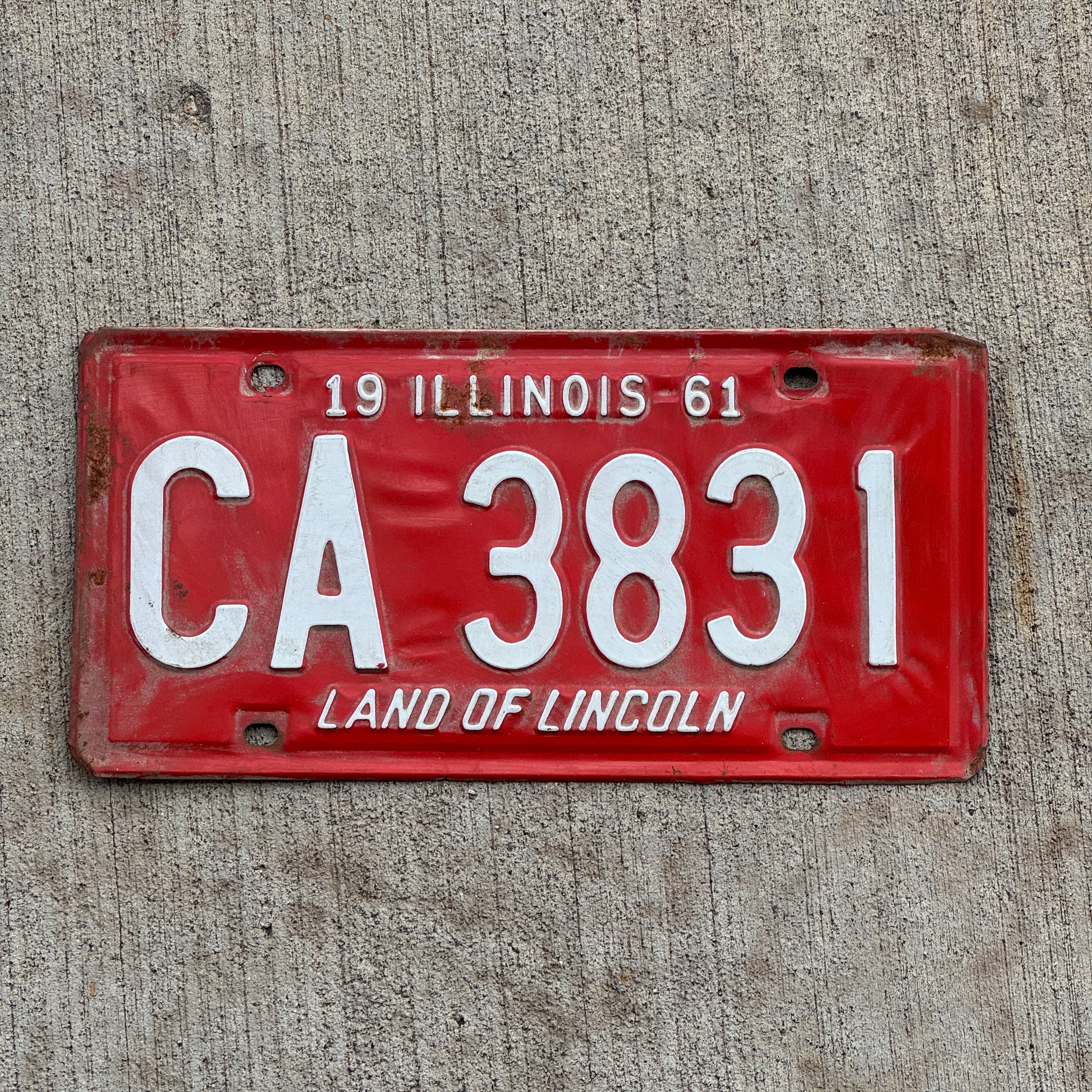 Photo of a 1961 Illinois License Plate Auto Tag Garage Decor Vintage CA 3831 with original patina