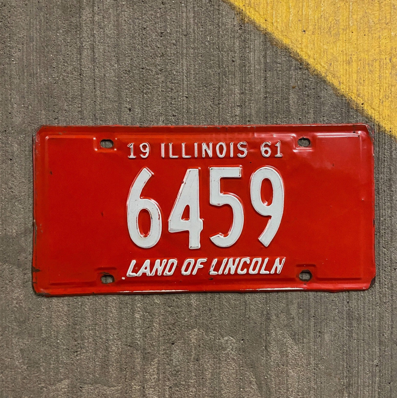 Photo of a 1961 Illinois License Plate Auto Tag Garage Decor Vintage Low Number Four Digit 6459 with original patina