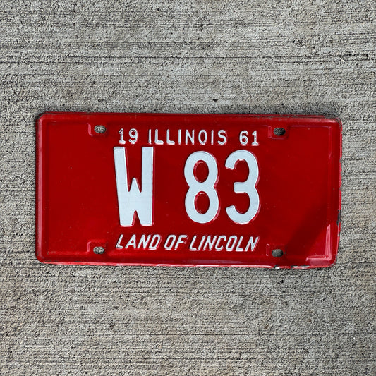 Photo of a 1961 Illinois Trailer License Plate Auto Tag Garage Decor Vintage Low Number Two Digit W 83 with original patina