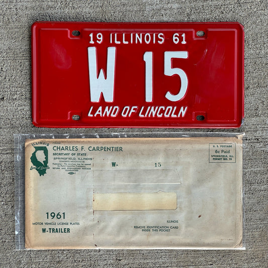 Photo of a 1961 Illinois Trailer License Plate Auto Tag Garage Decor Vintage Low Number Two Digit with Envelope W 15 with original patina