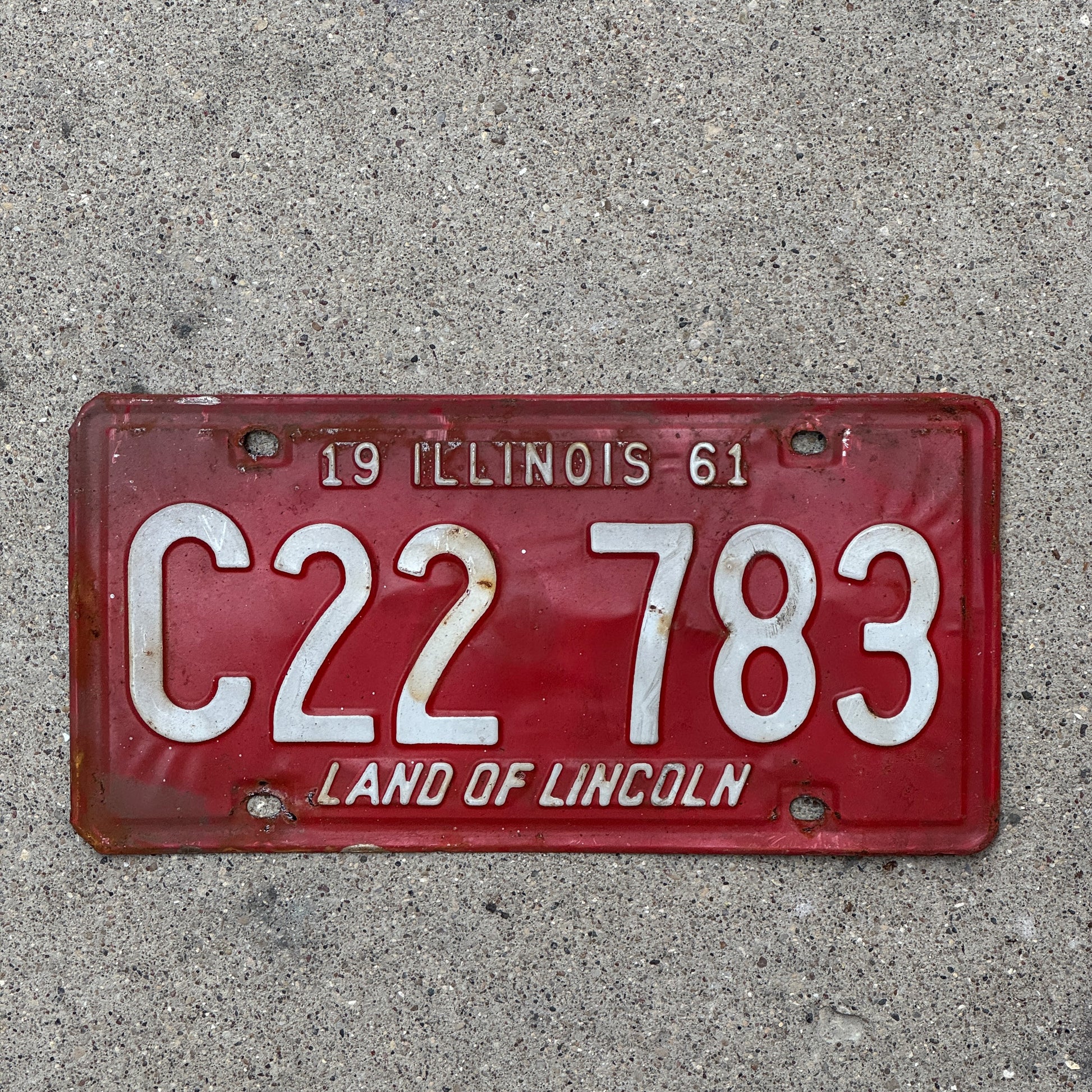 Photo of a 1961 Illinois Truck License Plate Auto Tag Garage Decor Vintage C 22 783 with original patina