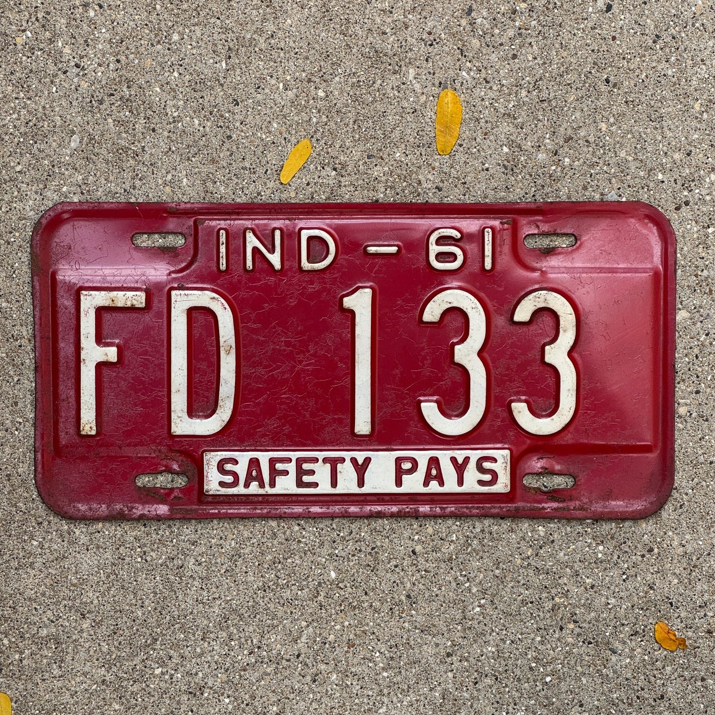 Photo of a 1961 Indiana License Plate Auto Tag Garage Decor Vintage FD 133 with original patina