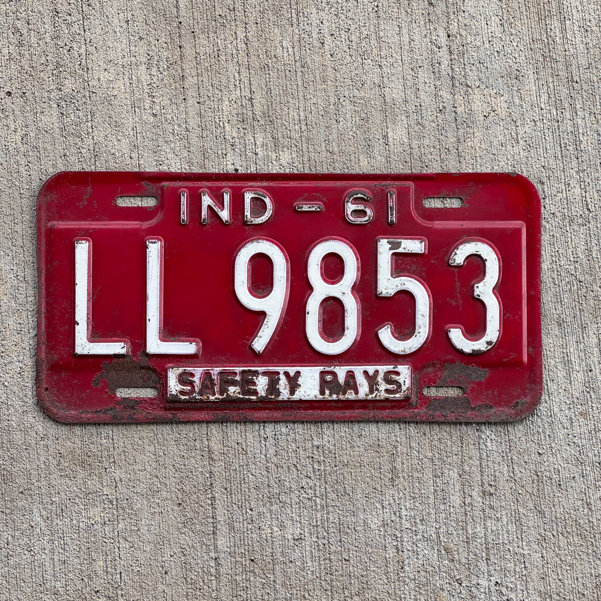 Photo of a 1961 Indiana License Plate Auto Tag Garage Decor Vintage LL 9853 with original patina