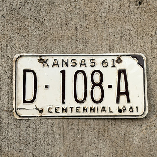 Photo of a 1961 Kansas Dealer License Plate Auto Tag Garage Decor Vintage D 108 A with original patina