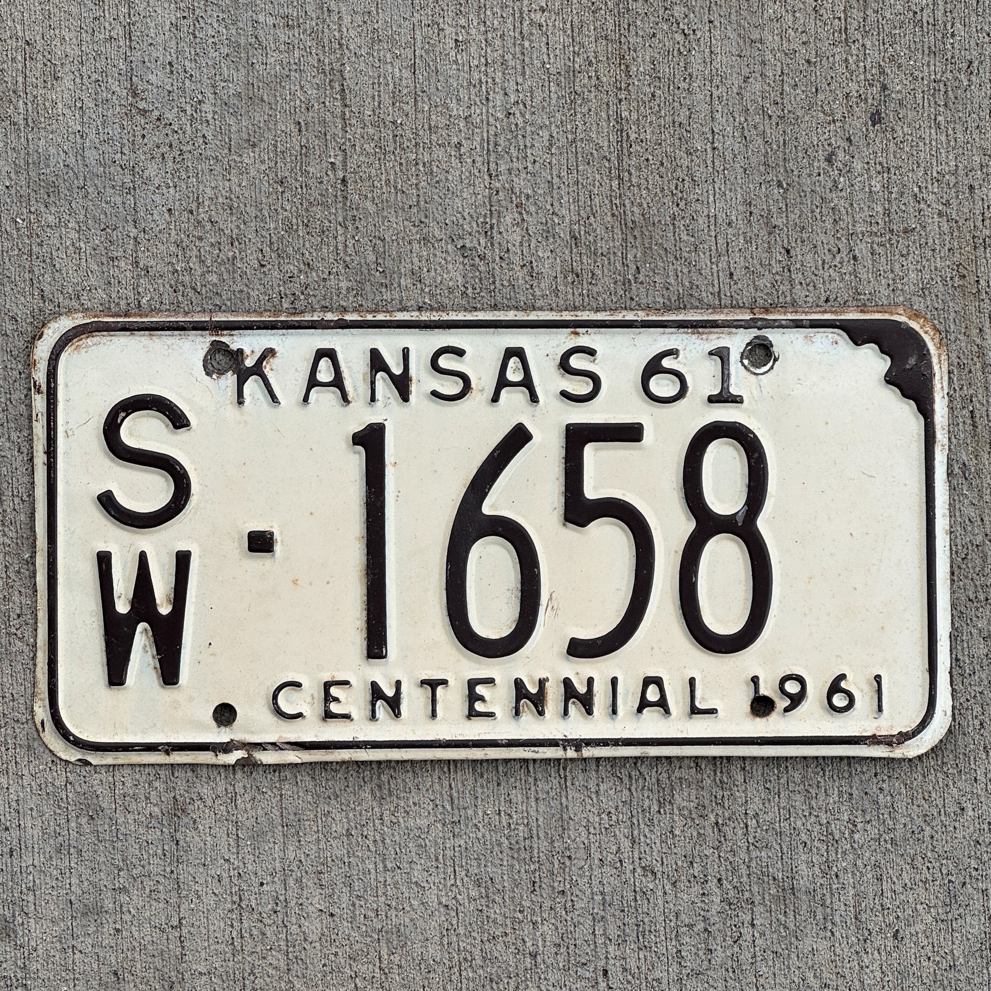 Photo of a 1961 Kansas License Plate Auto Tag Garage Decor Vintage SW 1658 with original patina