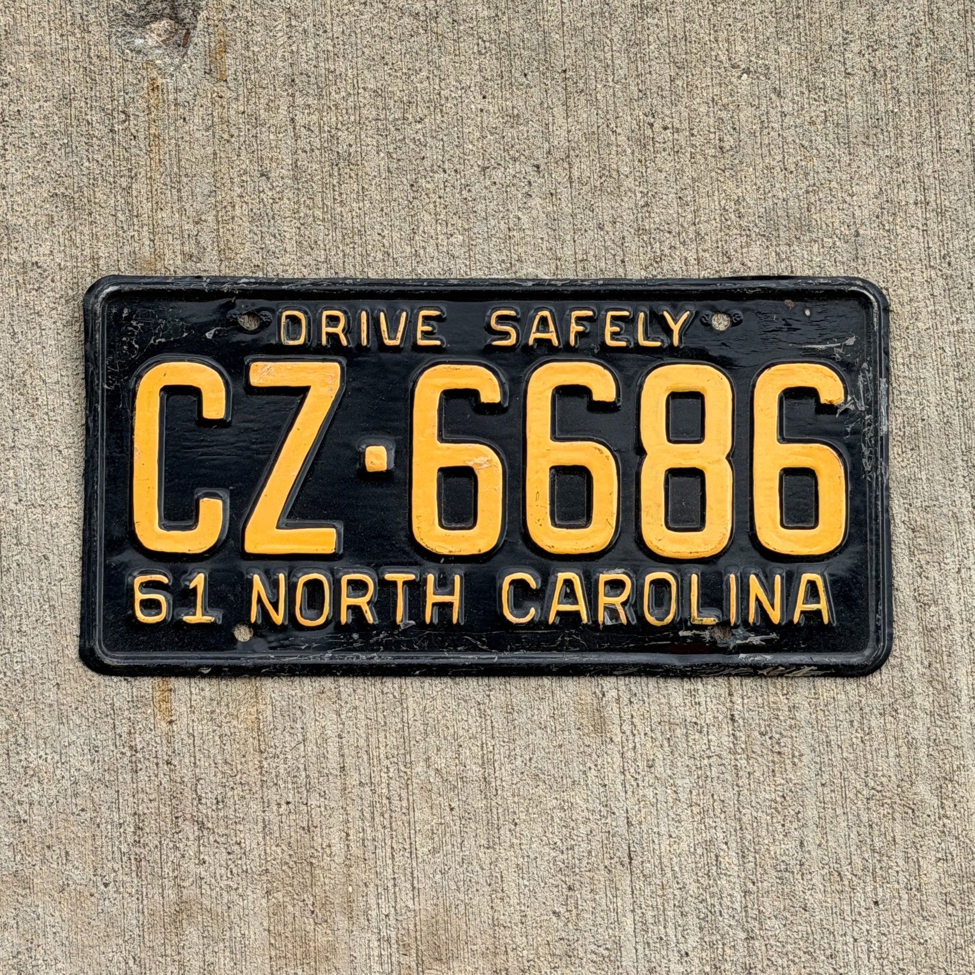Photo of a 1961 North Carolina License Plate Auto Tag Garage Decor Vintage CZ 6686 with original patina