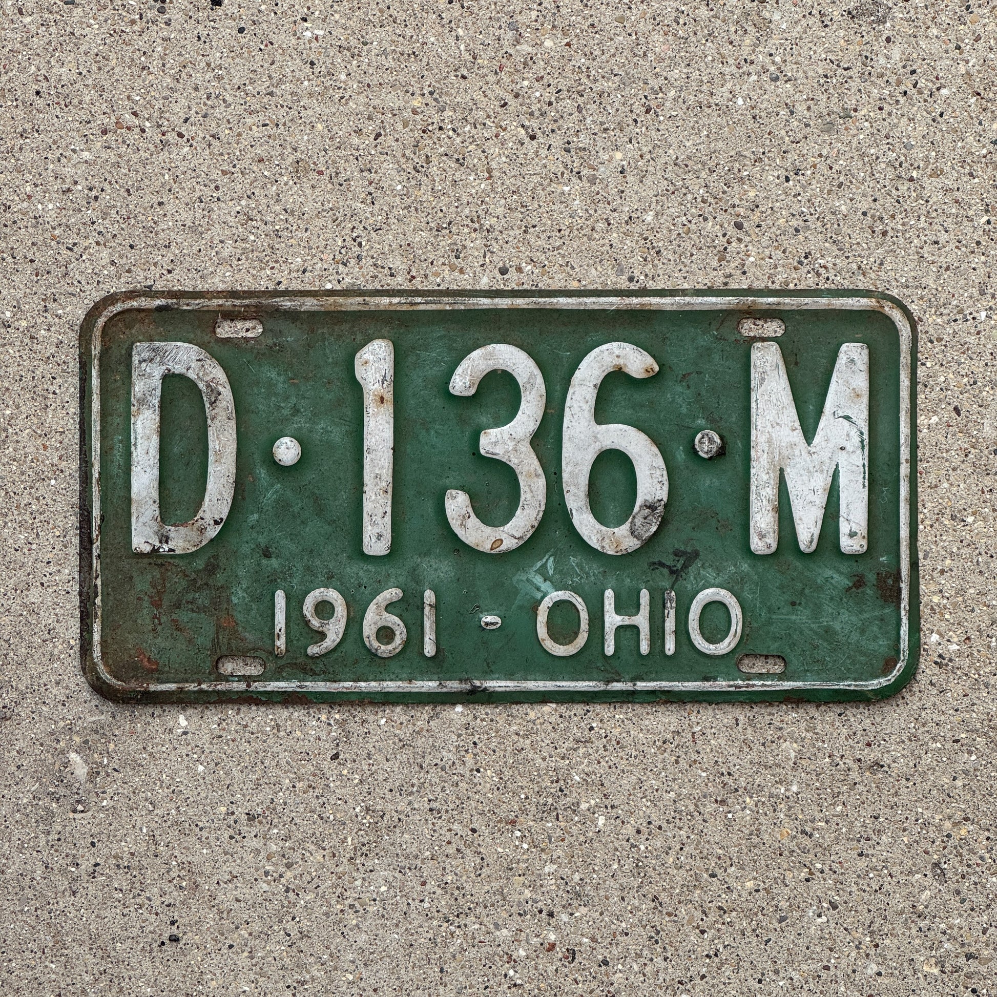 Photo of a 1961 Ohio License Plate Auto Tag Garage Decor Vintage D 136 M with original patina
