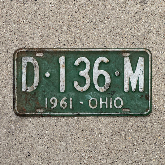 Photo of a 1961 Ohio License Plate Auto Tag Garage Decor Vintage D 136 M with original patina