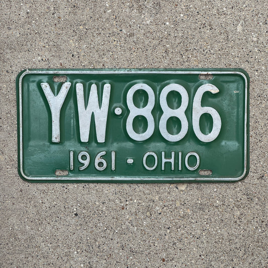 Photo of a 1961 Ohio License Plate Auto Tag Garage Decor Vintage YW 886 with original patina