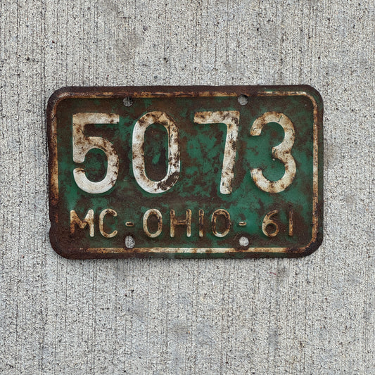 Photo of a 1961 Ohio Motorcycle License Plate Auto Tag Garage Decor Vintage 5073 with original patina