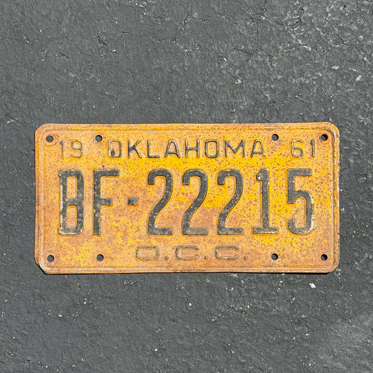 Photo of a 1961 Oklahoma Corporation Commission License Plate Auto Tag Garage Decor Vintage Repeat Repeating BF 22215 with original patina