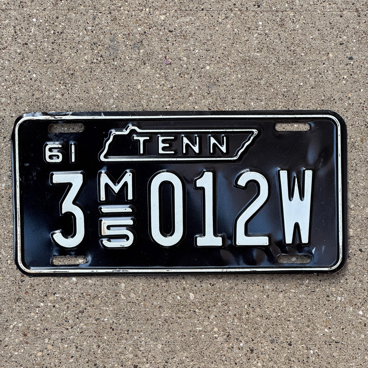 Photo of a 1961 Tennessee Household Mover License Plate Auto Tag Garage Decor Vintage 3 M5 012W