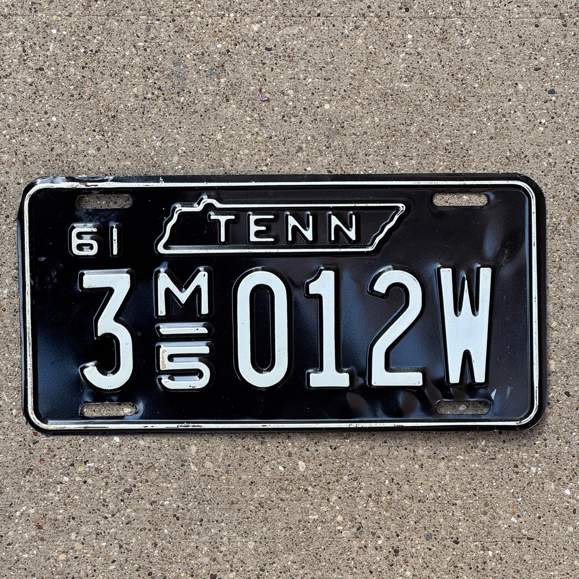 Photo of a 1961 Tennessee Household Mover License Plate Auto Tag Garage Decor Vintage 3 M5 012W