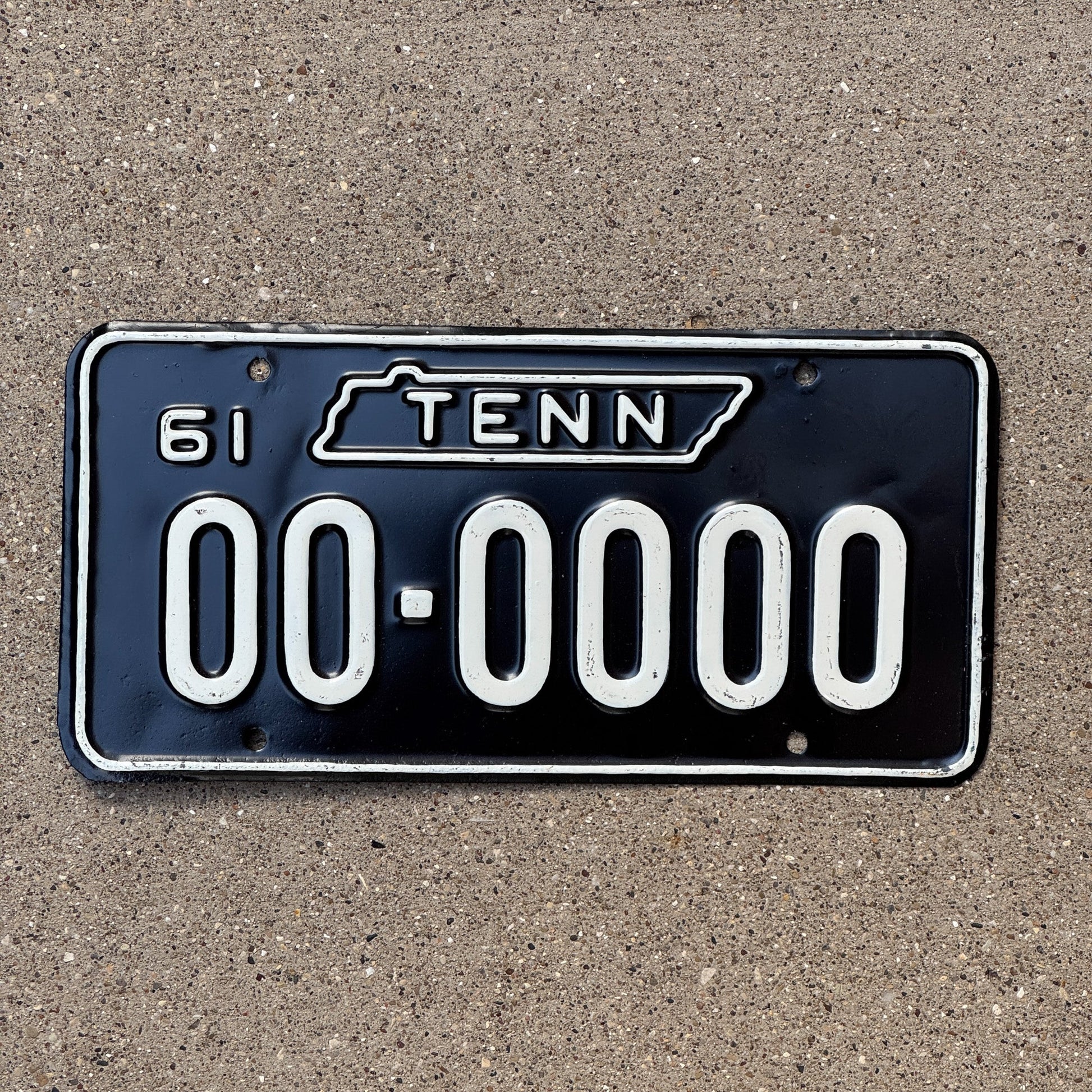 Photo of a 1961 Tennessee Sample License Plate Auto Tag Garage Decor Vintage 00 0000
